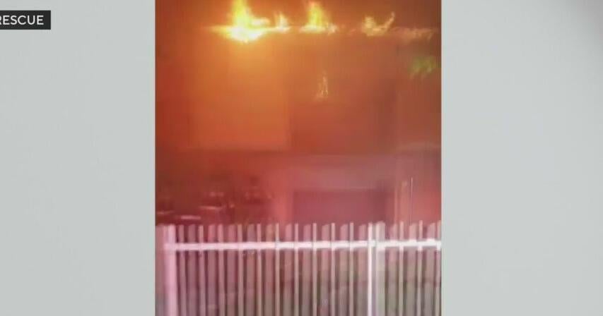 Flames shoot out of Northwest Miami-Dade apartment fire - CBS Miami