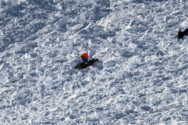 Three snowmobilers caught in avalanche on Colorado's Gravel