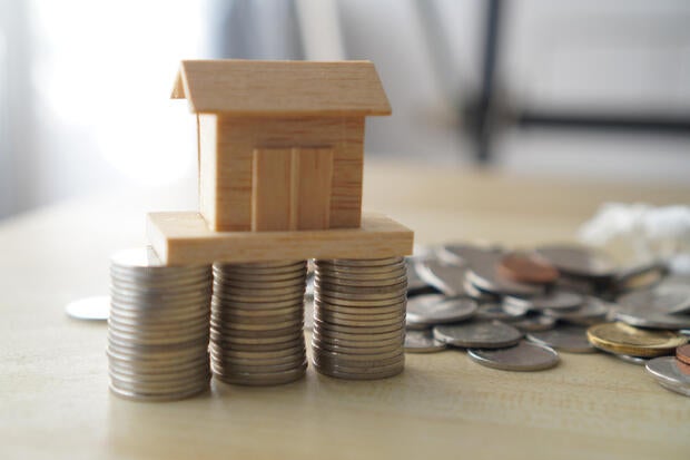 wood house model on cion background 