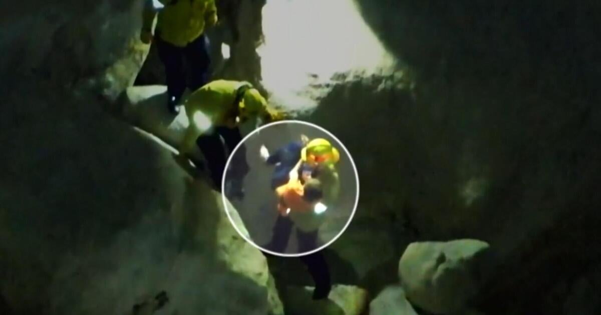 Teen rescued after being trapped in rock crevice for hours