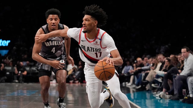 Portland Trail Blazers' Shaedon Sharpe (17) drives past Brooklyn Nets' Reece Beekman (4) during the first half of an NBA basketball game Friday, Feb. 28, 2025, in New York.
