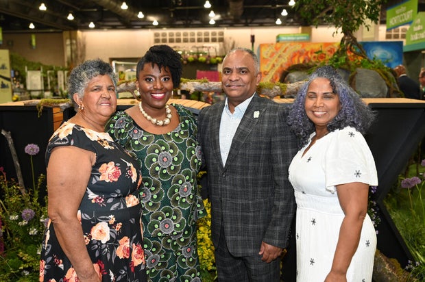 People pose for a photo at the Philadelphia Flower Show Preview Party