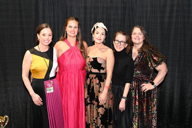 People pose for a photo at the Philadelphia Flower Show Preview Party