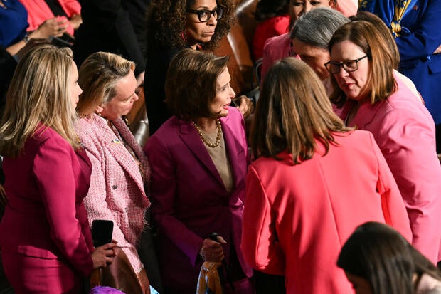 Rep. Nancy Pelosi, a Democrat from California, gathers with other female lawmakers wearing pink ahead of President Trump's address to a joint session of Congress in the House chamber of the U.S. Capitol in Washington, D.C., on March 4, 2025. 