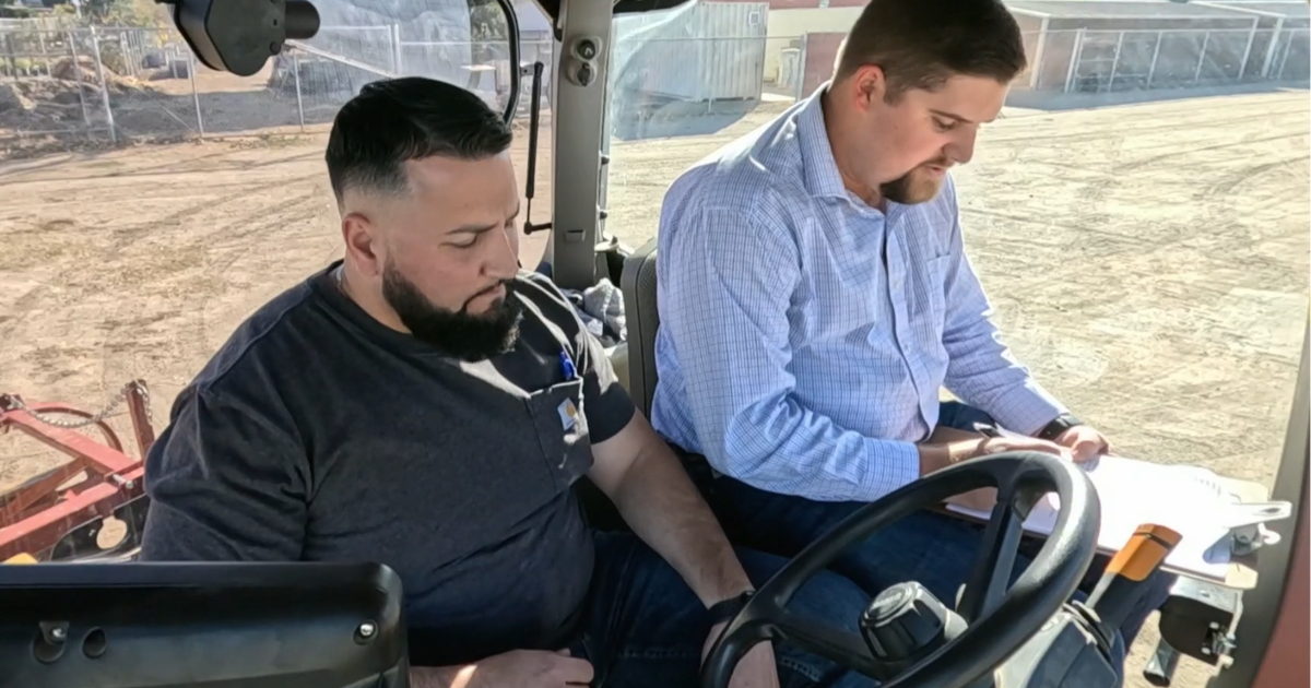 College student's classroom is the farm where he works