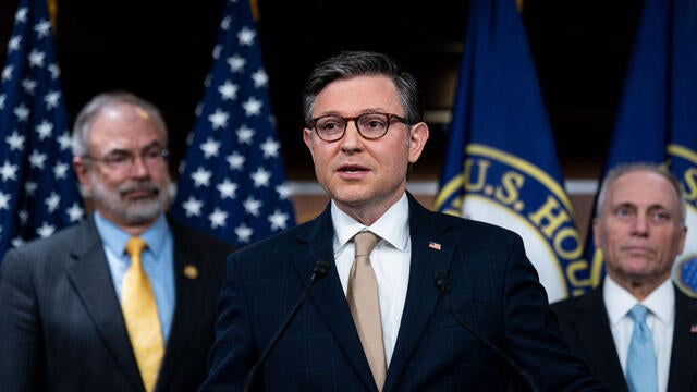 Speaker of the House Mike Johnson talks with reporters inside the U.S. Capitol building ahead of votes in Washington, DC on March 6, 2025. 