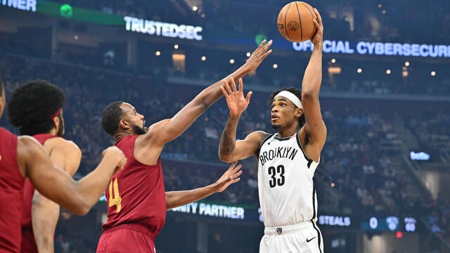 Nic Claxton #33 of the Brooklyn Nets shoots over Evan Mobley #4 of the Cleveland Cavaliers during the first quarter at Rocket Arena on March 11, 2025 in Cleveland, Ohio. 