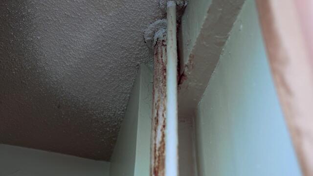 A leaky pipe in an apartment 