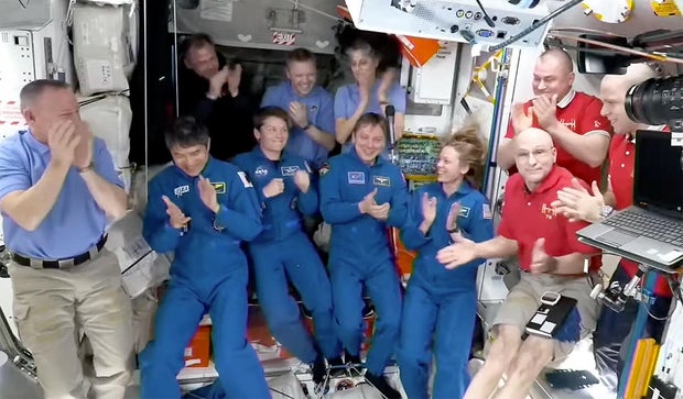 031625-welcome-aboard How did the astronauts return to Earth?