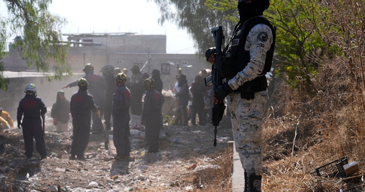 Armed men release video denouncing group searching for missing relatives at site of suspected cartel training camp