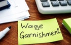Wage Garnishment written on the yellow sheet. 