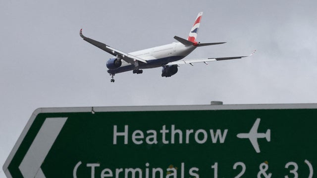 FILE PHOTO: Planes make landing approach to Heathrow Airport in west London 