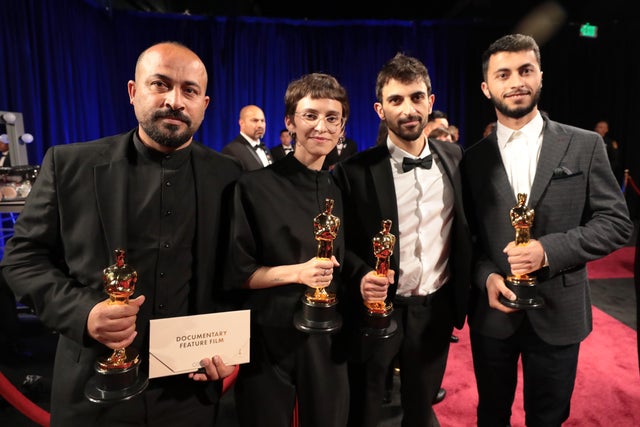 From left, Hamdan Ballal, Rachel Szor, Basel Adra and Yuval Abraham attend the 97th annual Oscars at Dolby Theatre on March 2, 2025, in Hollywood, California. 