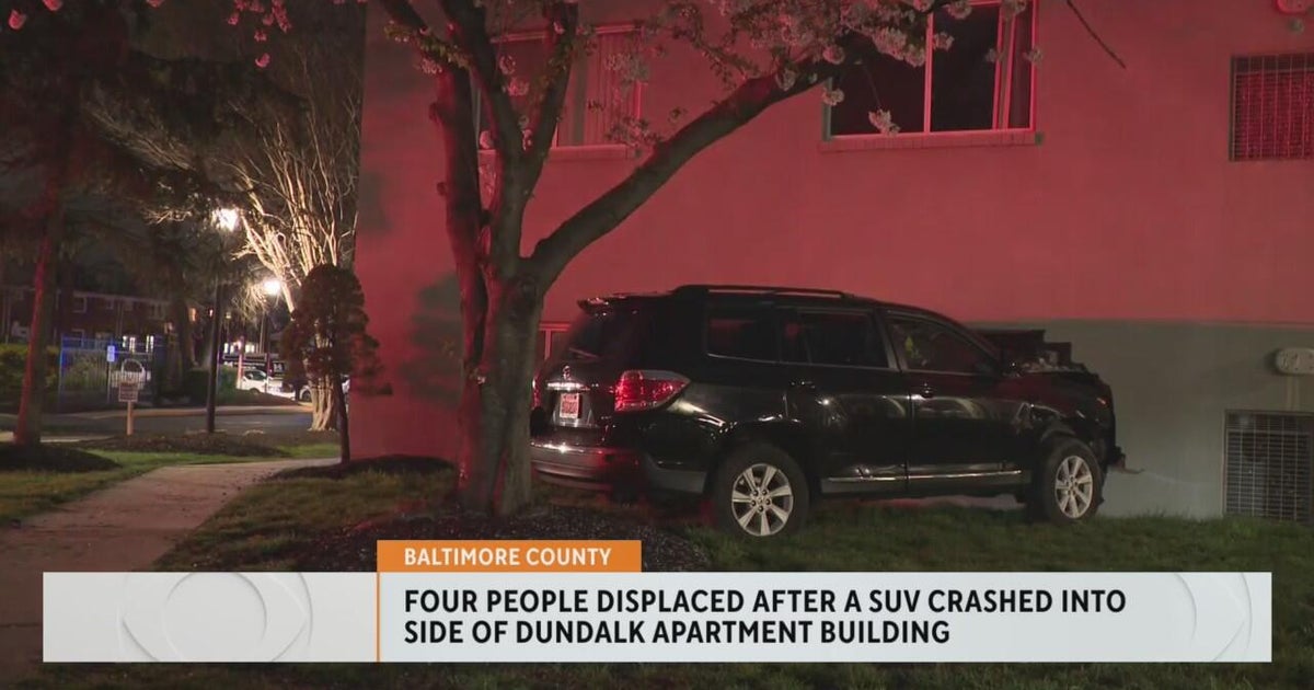 Four people displaced after SUV Crashes into apartment building in ...
