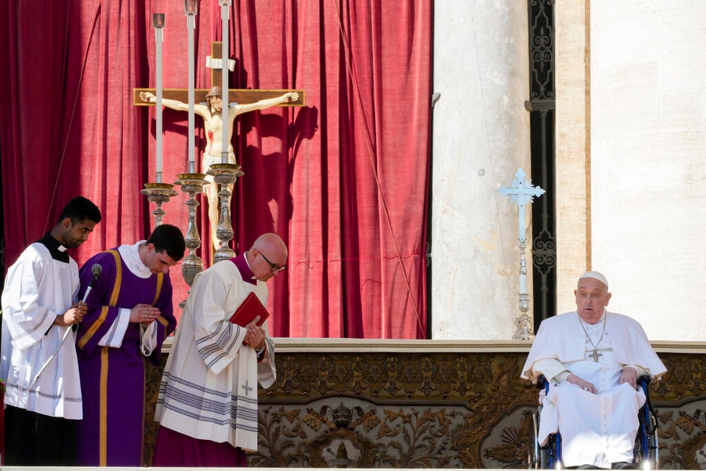 Pope Francis arrives on a wheelchair at the end of a mass in St. Peter's Square at The Vatican, Sunday, April 6, 2025, part of the jubilee of the sick and the health workers