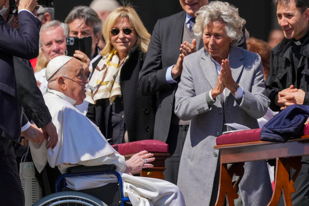 Pope Francis is cheered at by faithful at the end of a mass in St. Peter's Square at The Vatican. Sunday, April 6, 2025, part of the Jubilee of the sick and the health workers