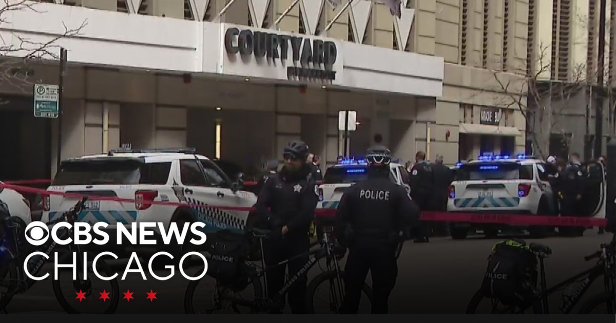 "Wanted" man shot by police in hotel lobby - CBS Chicago