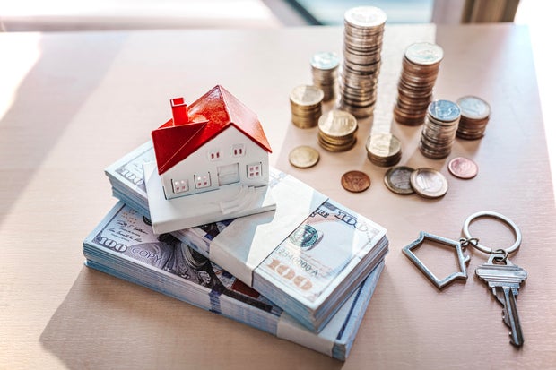 Home concept, Home savings, Selling home, Money and house, Business and finance concept 