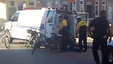 Freddie Gray placed into a police van in Baltimore 