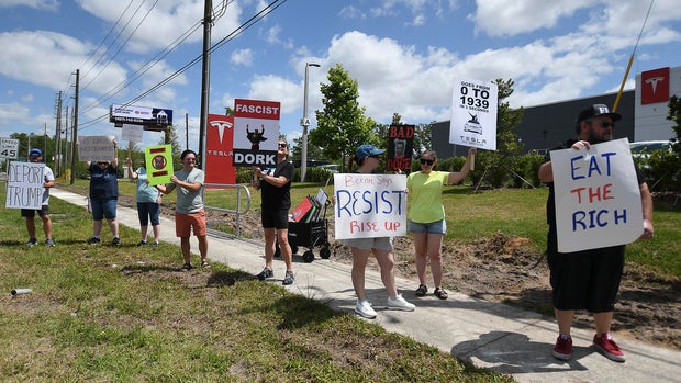 Protesteis In Front Of A Tesla Store 
