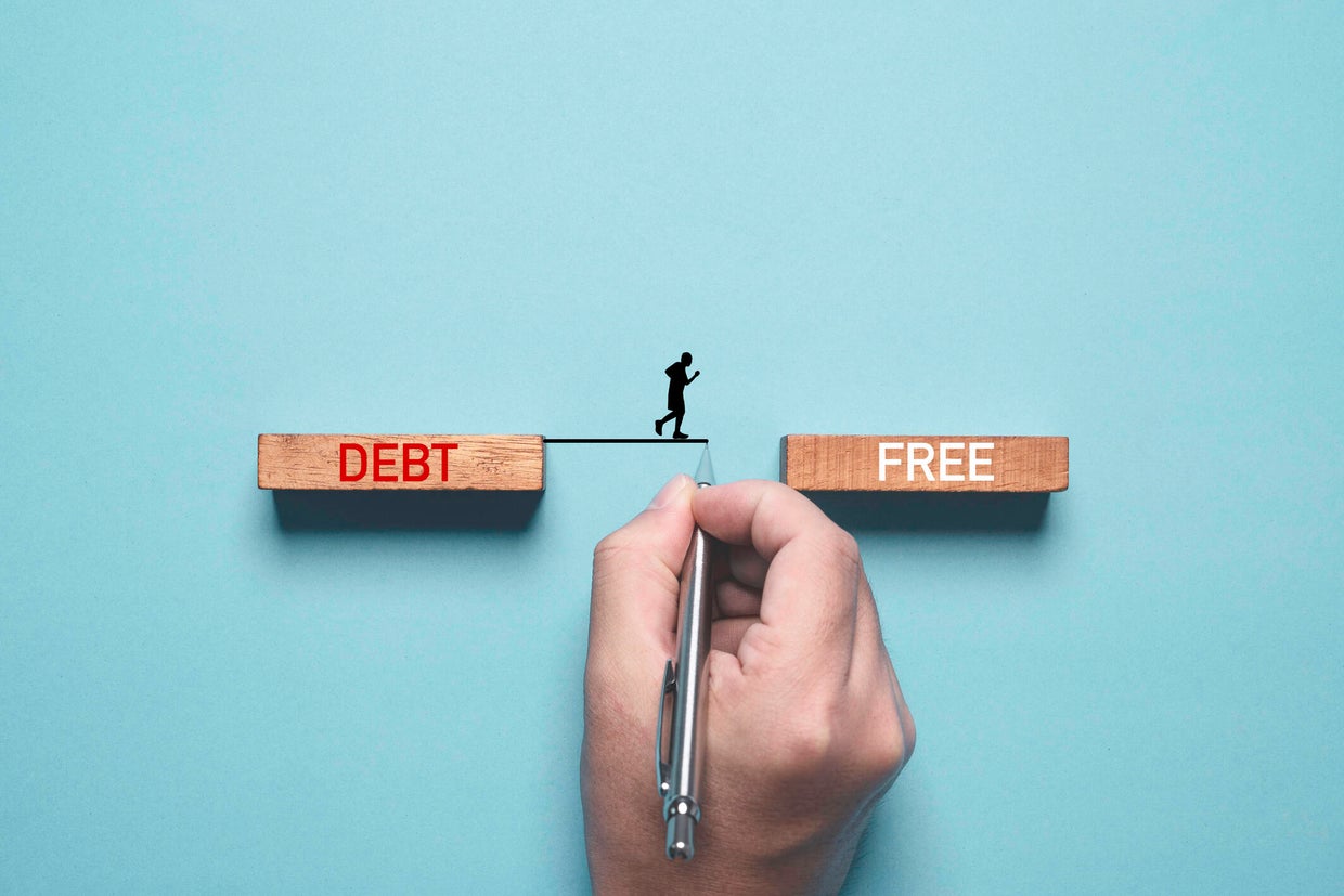 Hand writing line to connect between deb and free wording for solving business consumer burden financial debt or borrow mortgage failure crisis concept.