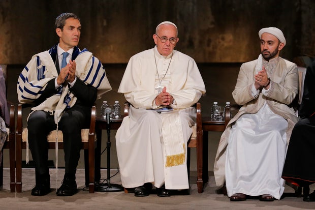 Pope Francis sits with Rabbi Elliot J. Cosgrove (L) and Iman Khalid Latif (R), Executive Director of the Islamic Center and chaplain to the students at New York University, during a multi-religious ceremony at the 9/11 Memorial and Museum on on September 25, 2015 in New York City. 