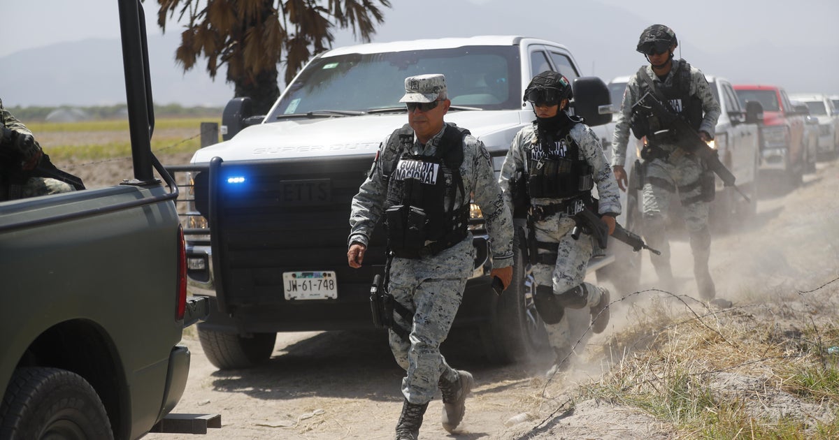 Gunmen torch vehicles across Mexico as cartel turf war rages
