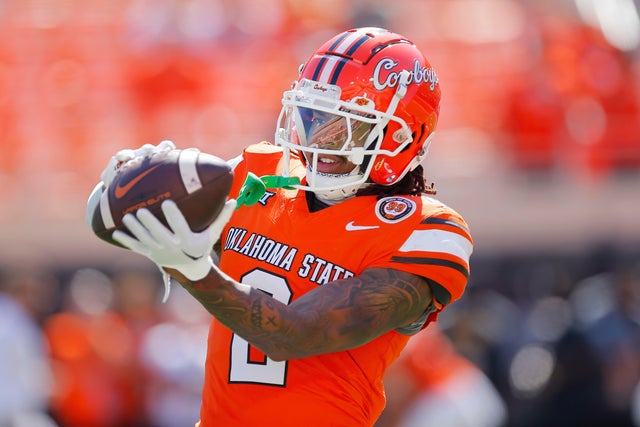 Cornerback Korie Black #2 of the Oklahoma State Cowboys catches a pass before a game against the West Virginia Mountaineers at Boone Pickens Stadium on October 5, 2024 in Stillwater, Oklahoma. 