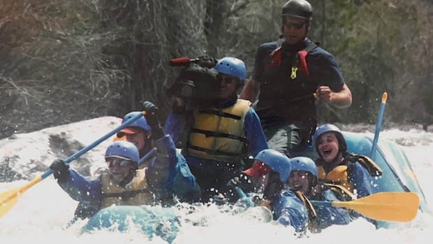 john-mason-with-camera-while-rafting.png 