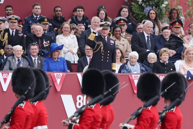 The Royal Family Watch Military Procession To Mark The 80th Anniversary Of VE Day