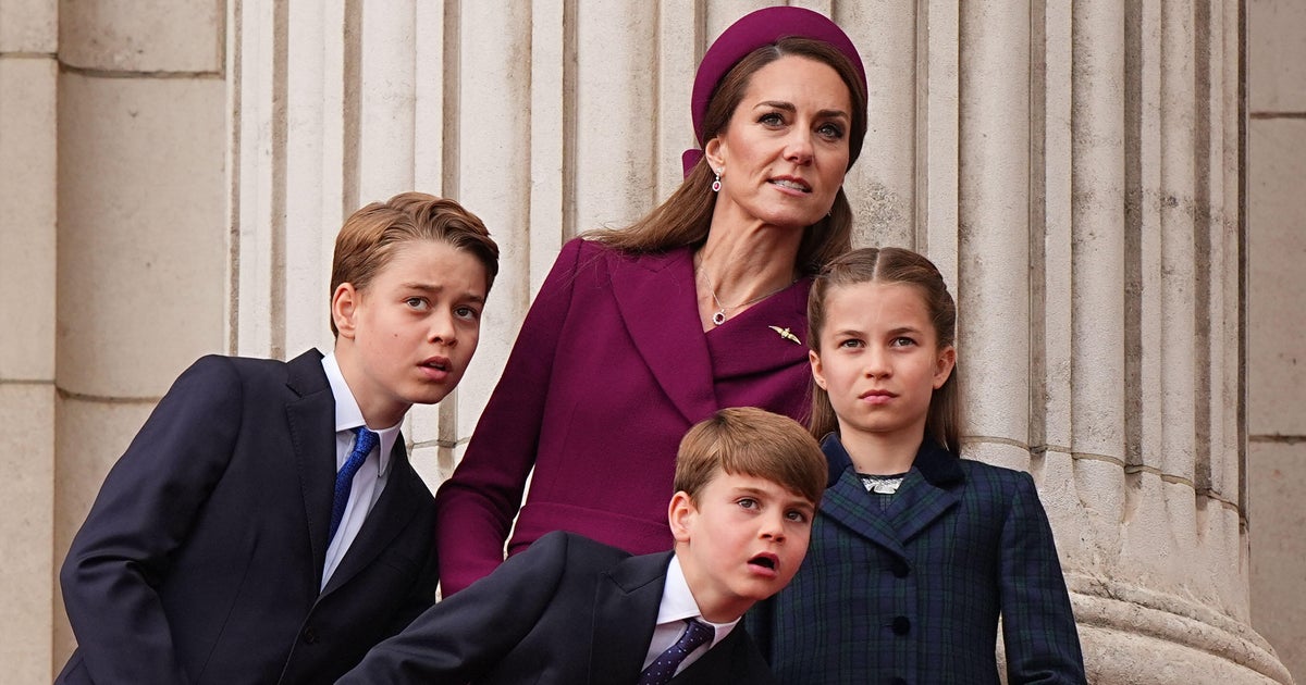 Pictures show royal family watching military procession, flypast to mark VE Day`s 80th anniversary
