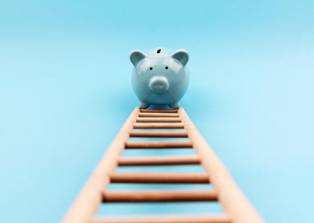Piggy Bank Climbing a Stair 
