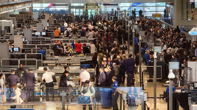 People line up to enter Transportation Security Administration checkpoints in Los Angeles International Airport in California on Jan. 6, 2025. 