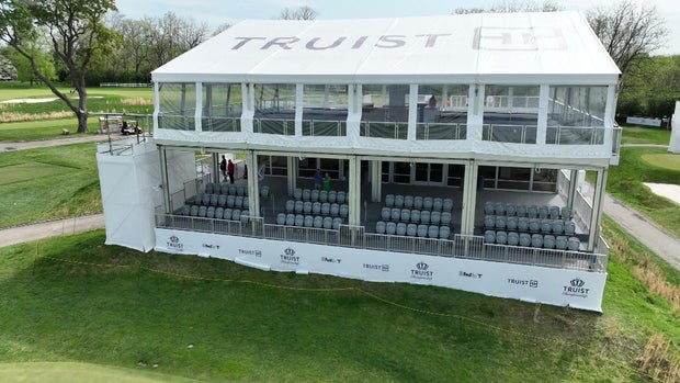 Drone shot of stands for fans near the green at the Philadelphia Cricket Club's Wissahickon Course