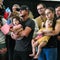 White South Africans arrive in U.S. after being granted refugee status