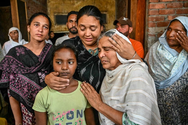 21 dead people, 10 hospitalized after drinking contaminated liquor in India; Multiple arrests made 1 India-Crime-Alcohol