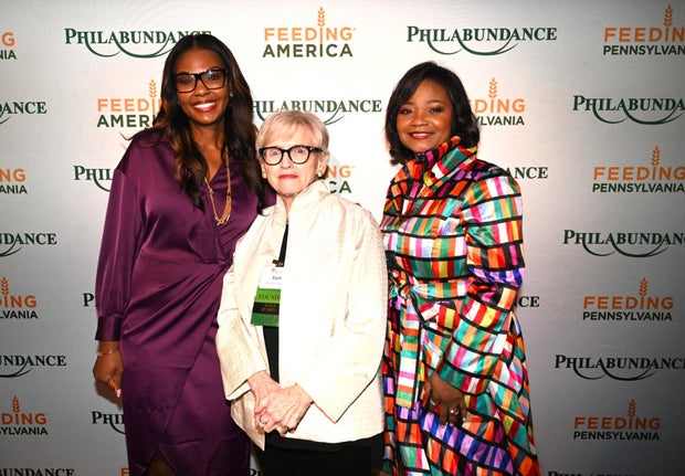 People pose for a photo at the Philabundance event 