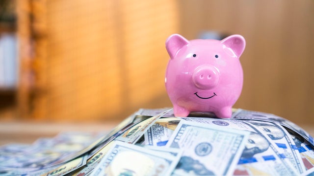 Piggy bank with dollars banknotes.Some similar pictures 