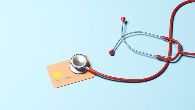 Stethoscope checking health of Credit card 