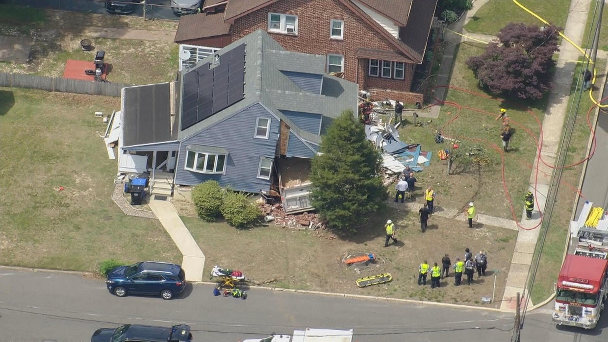 Dump truck slams into home in Woodbury Heights, New Jersey - CBS ...