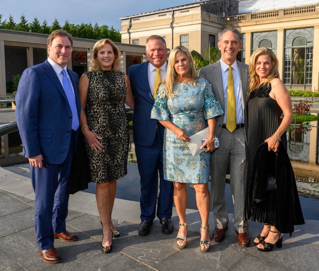 People pose for a photo at a gala for Nemours 