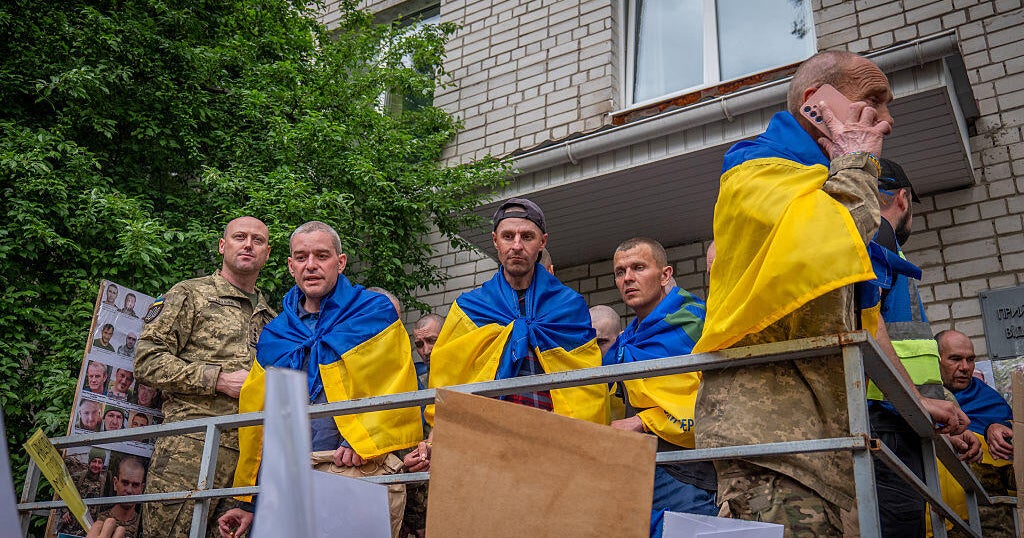 Russia and Ukraine swap hundreds of prisoners as airstrikes on Kyiv continue