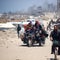 Aid trucks to Gaza are "drop in the bucket" compared to need: WFP director