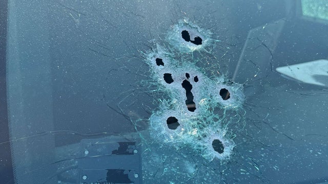 A picture released by the Polk County Sheriff's Office in Florida shows what appears to be bullet holes in a patrol vehicle after sheriff's deputies shot a man in the vehicle, May 26, 2025. 