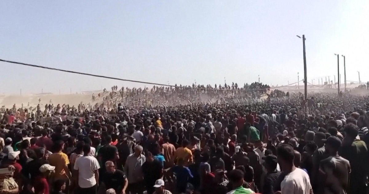 Palestinians rush to new aid centers in Gaza as chaos erupts