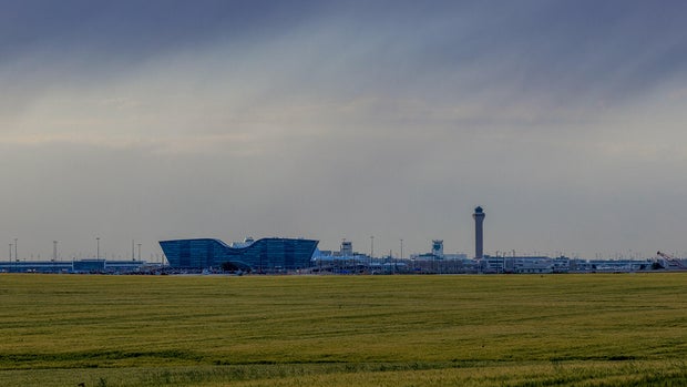 Denver International Airport against the stormy sky 