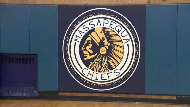 The Massapequa Chiefs logo on the wall of a gymnasium 