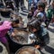 U.N. food trucks blocked, offloaded by hungry Palestinians in Gaza