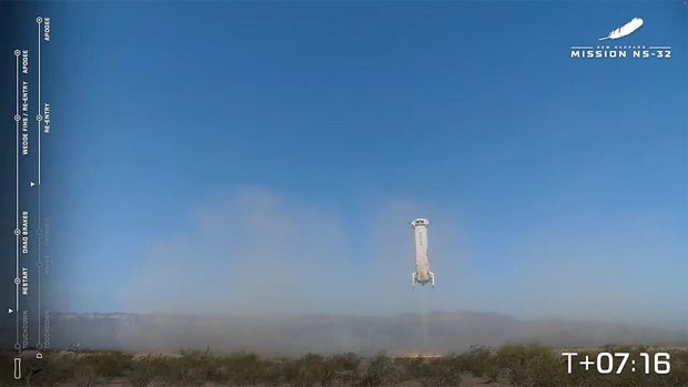 Passenger Gretchen Green celebrates her trip to space after touchdown in the West Texas desert.Blue Origin webcast