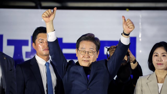 Lee Jae-myung, the presidential candidate for South Korea's Democratic Party, gestures as he greets his supporters in front of the National Assembly in Seoul, South Korea, June 4, 2025. 